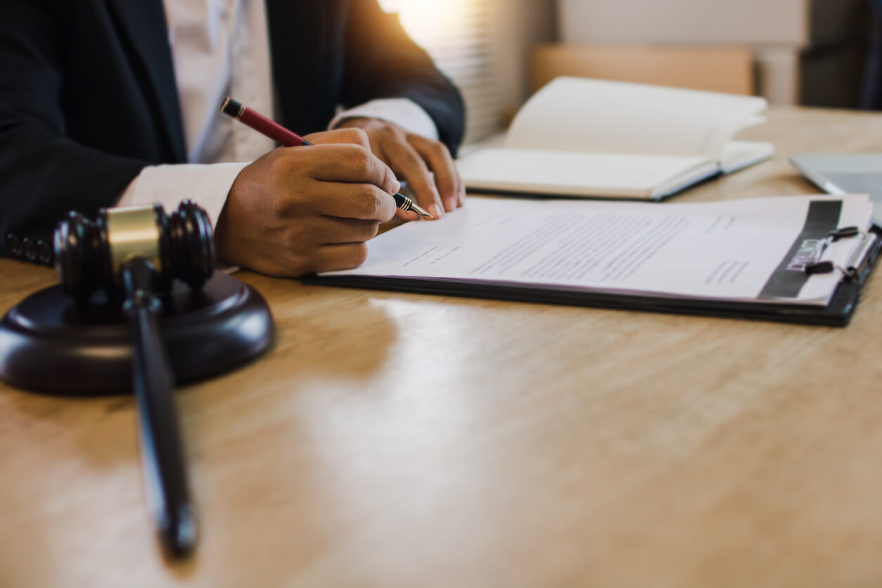Lawyer helping client decide if probate is necessary.